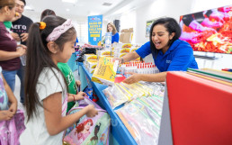 Donation of backpacks and school supplies to 12 schools across the United States